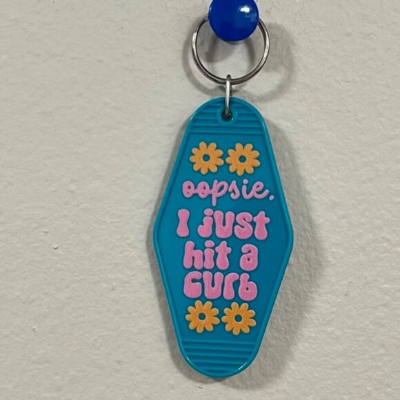 Accessories - I just hit a curb NEW motel keychain